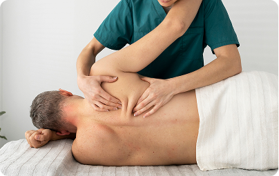 Therapist giving a chiropractic back massage
